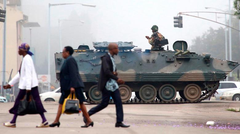 An armed soldier patrols a street in Harare, Zimbabwe, Wednesday, Nov. 15, 2017.