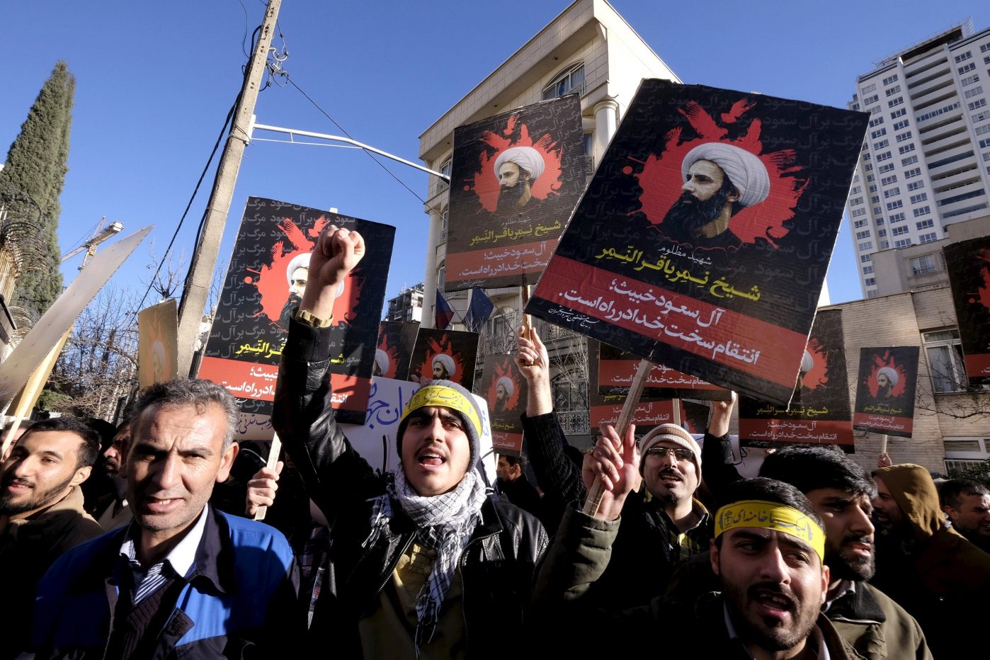 Dark days forecast over Trump's Jerusalem declaration 1 - WTX News Breaking News, fashion & Culture from around the World - Daily News Briefings -Finance, Business, Politics & Sports News Iranian protesters chant slogans as they hold pictures of Shi'ite cleric Sheikh Nimr al-Nimr during a demonstration against the execution of Nimr in Saudi Arabia, outside the Saudi Arabian Embassy in Tehran