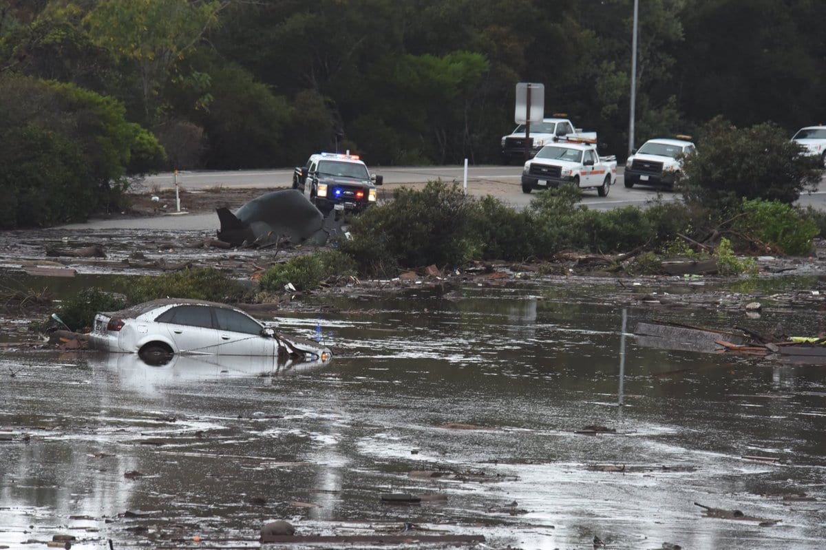 The US 101 Freeway at the Olive Mill Road overpass flooded with runoff water from Montecito Creek. #CAstorm