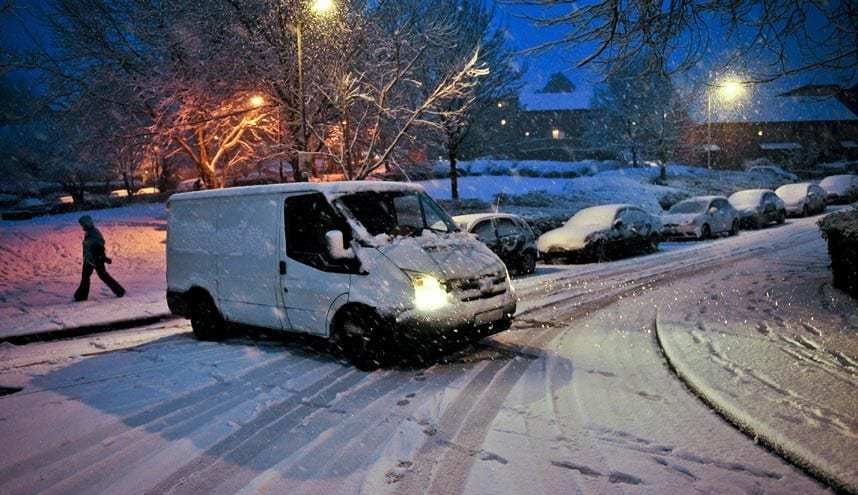 Snow weather postman UK travel disruption across the UK