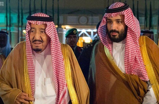 A handout picture provided by the Saudi Royal Palace on December 13, 2017, shows Saudi King Salman bin Abdulaziz (R) and Saudi Crown Prince Mohammed bin Salman in Riyadh