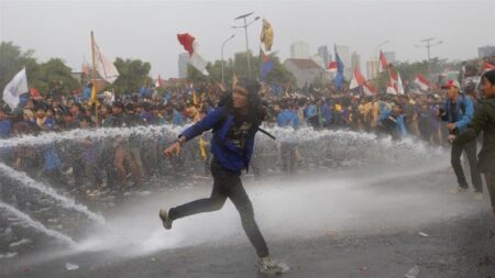 Indonesia protests: police fire tear gas, water cannons as students protest law that would criminalise extramarital sex