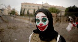 Joker movie make-up and masks have been adopted by protesters worldwide