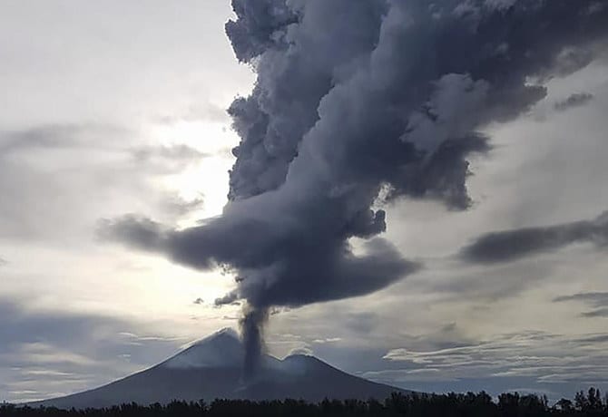 Volcano erupts sending lava shooting in the air