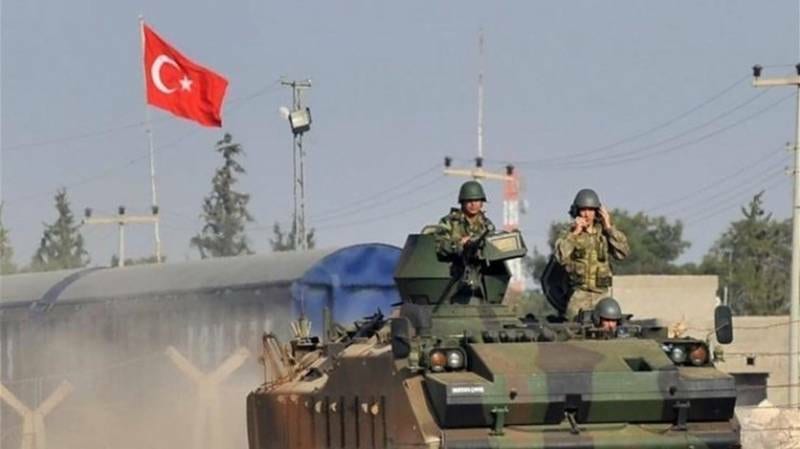 Turkey dismisses US threats, amasses troops on Syrian border