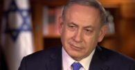 Israeli PM Netanyahu defiant after being charged with corruption