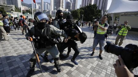 Hong-Kong-protests-erupt as police shoot protester in the street