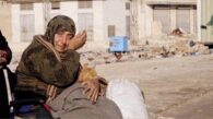woman forced to flee - Idlib