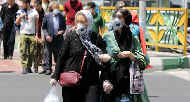 Iran accused of hiding Covid-19 deaths as police arrest 320 for spreading rumours