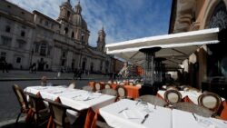 An empty restaurant in Rome's Piazza Navona square - The impact of global recession coming our way