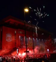 Anfield stadium is hounded by thousands of supporters celebrating Liverpool being crowned champions of England