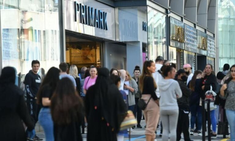 Long queues as shops reopen in England