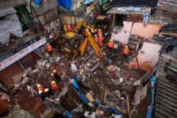 Eight children among 11 killed in horror building collapse ’caused by heavy rain’