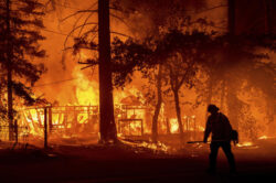 Two California wildfires merge, sparking more evacuations