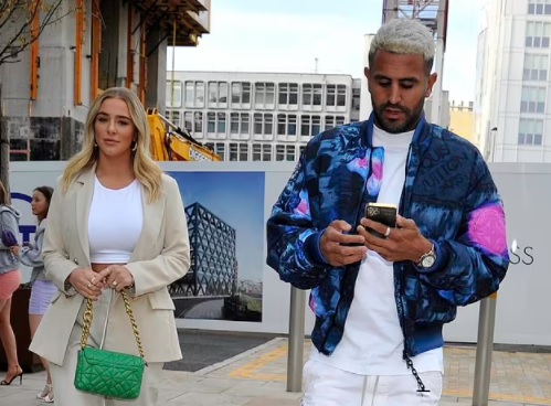 Taylor Ward, 23, flashes her sparkling engagement ring as she steps out with fiancé Riyad Mahrez, 30, for dinner date in Manchester