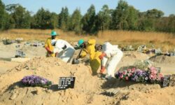 ‘Our morgues are full’: Zimbabwe struggles with surge in Covid burials