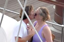Julia Roberts and husband Daniel Moder kiss aboard a luxury yacht