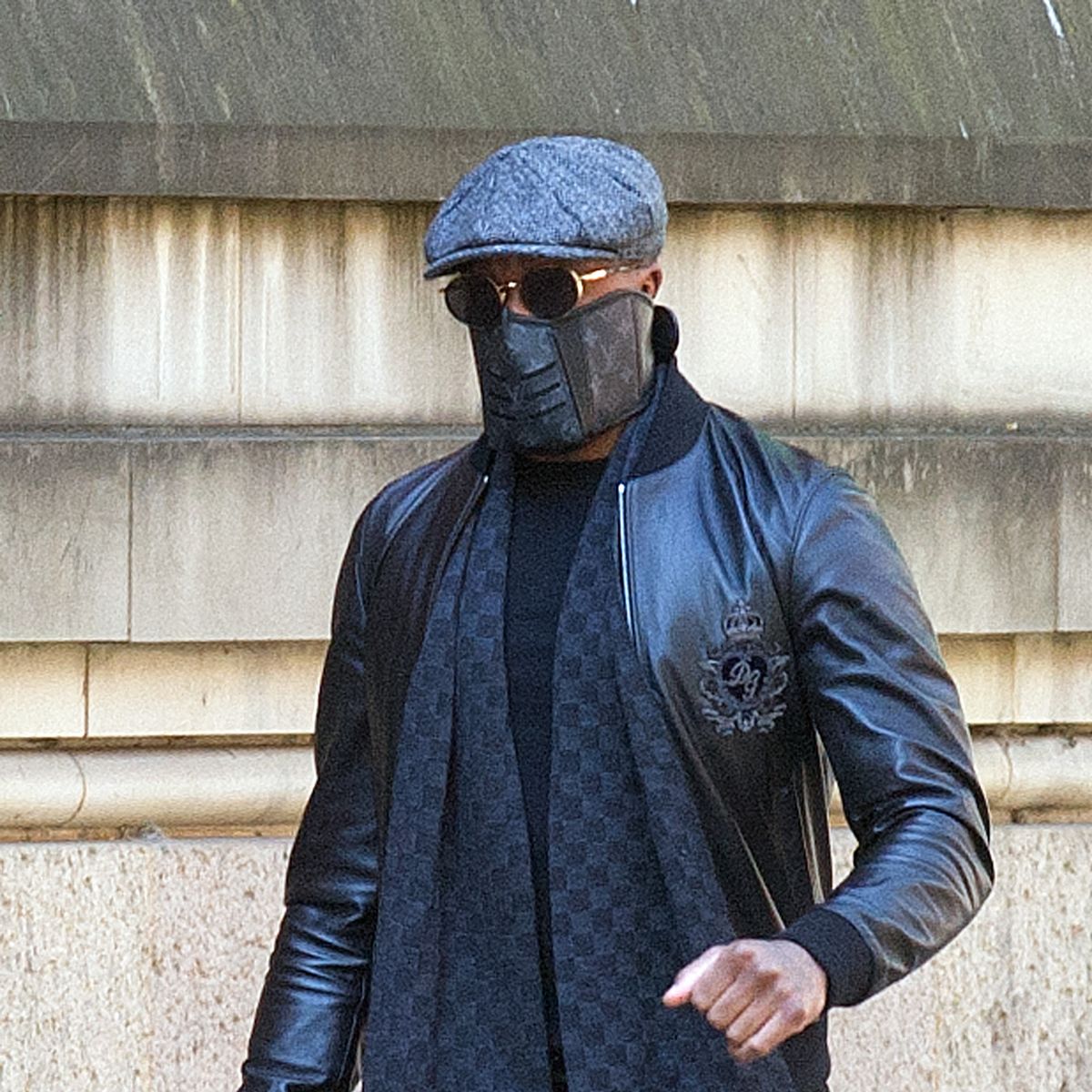 Rapper Bugzy Malone 'punched two strangers in retribution