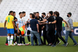 Chaos during Brazil v Argentina as health officials storm pitch to deport players