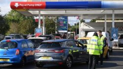 Petrol chaos could last another MONTH as Brits queue through the night again
