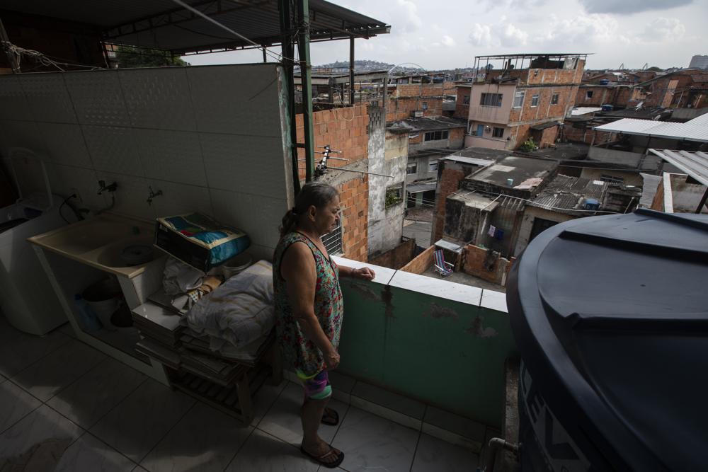 Brazil coronavirus cases update - Waiting for a booster shot - an old woman lives in isolation, in Rio de Janeiro, Brazil, amid the fear of rise delta variant. waiting to get a booster shot