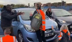 Insulate Britain bring M25 to a halt: Commuters turn violent as eco mob dragged off road
