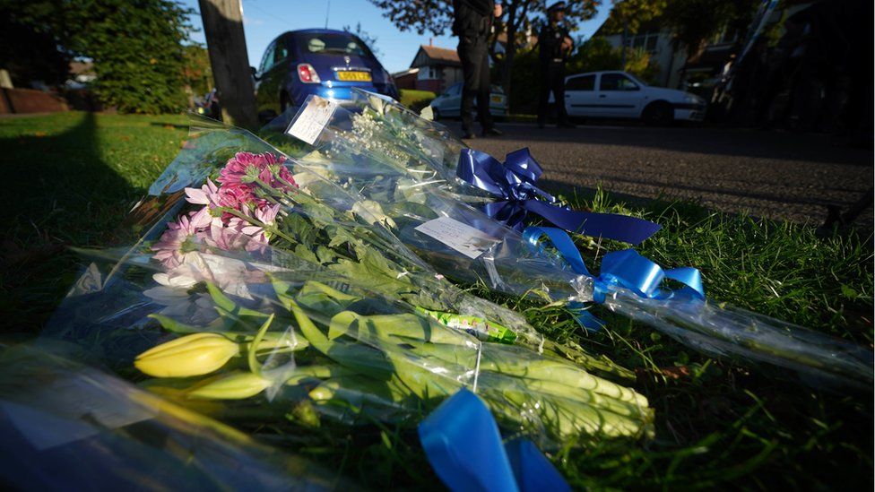 Members of the public left flowers near the scene where the Conservative MP died