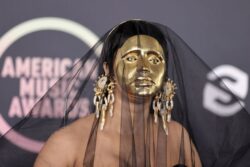 Cardi B makes stunning entrance to American Music Awards 2021 in striking gold mask
