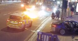 Terrifying moment man crashes car into cop station and sets road on FIRE before hero tackles him to the ground