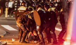 Rotterdam police open fire as Covid protest turns into ‘orgy of violence’