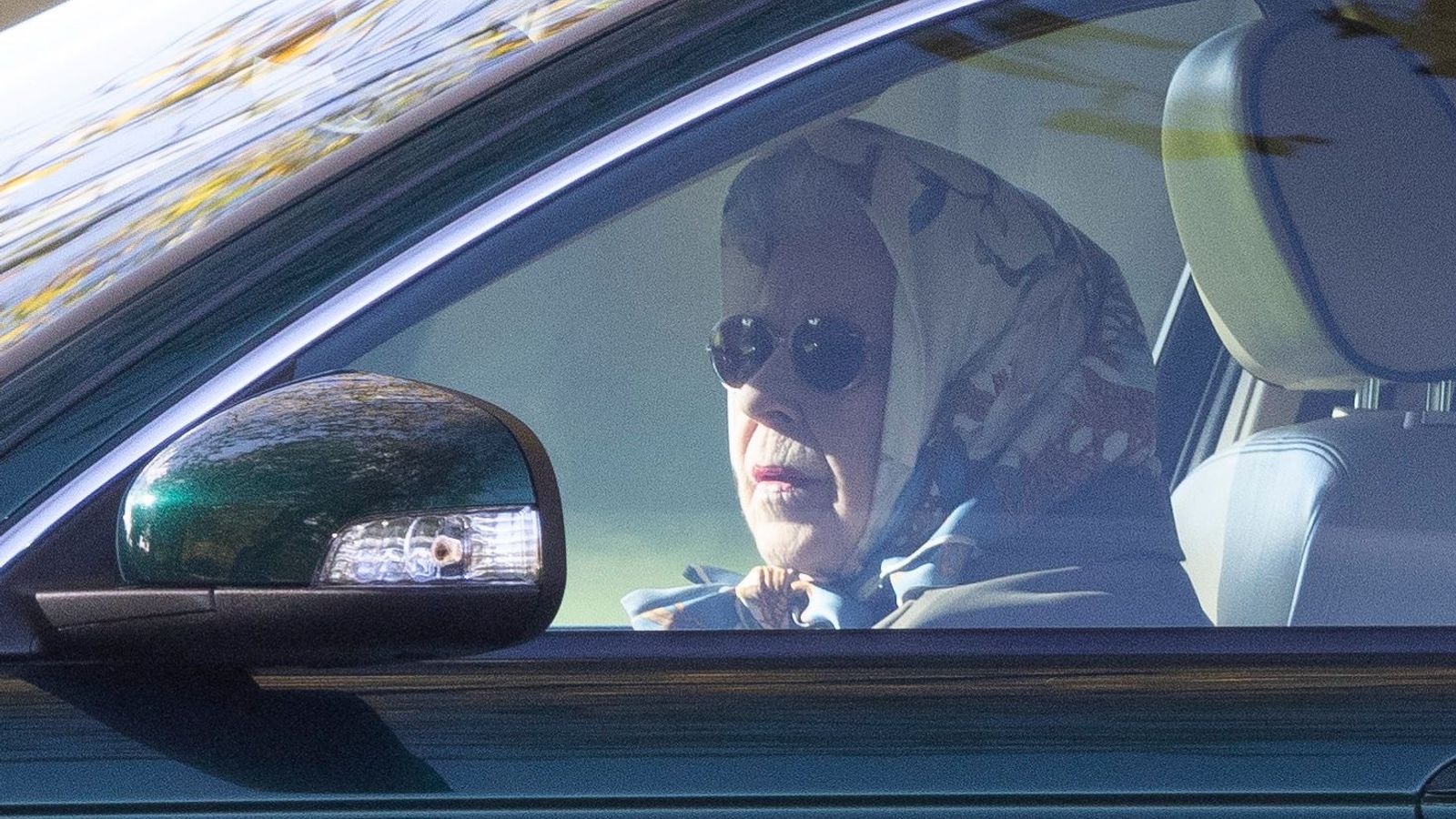 Queen seen for first time since illness as she enjoys a solo drive around Windsor estate