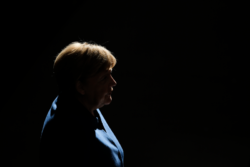 Angela Merkel urges Germans to stand up to hatred as she bids farewell to office