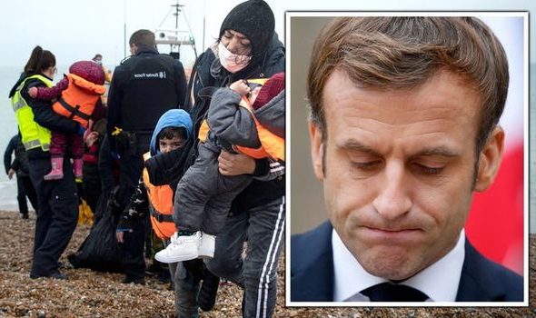 Macron backs down in migrant row and offers UK new olive branch
