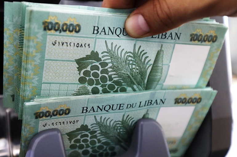 Lebanese currency drops to record low