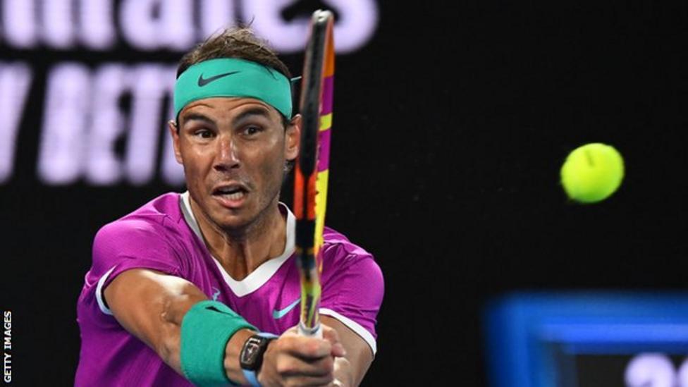 Rafa Nadal hitting the winning shot as -Nadal beats Matteo Berrettini to reach Australian Open final