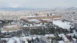 Drone footage captures ancient Athens sites covered in snow after rare cold snap