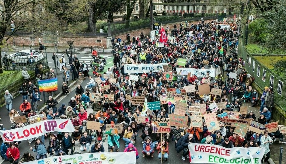 Thousands march in climate protests across France