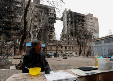 Russia gives Ukrainian forces last warning 7 hours to surrender or else as a man sits outside what used to be his home