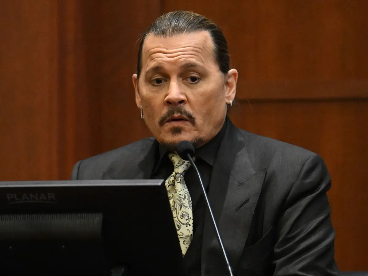 Johnny Depp says he is ‘not embarrassed’ as he testifies in trial against ex-wife Amber Heard
