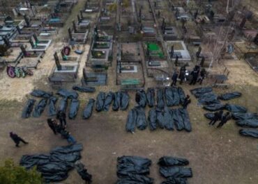 Ukraine to go on offensive after mass graves found with more than 1,200 bodies