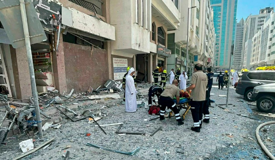 Gas cylinder blast in Abu Dhabi confirmed by Abu Dhabi Police, debris covers the street after an explosion in the Khalidiya district of Abu Dhabi, United Arab Emirates, Monday, May 23, 2022. A gas cylinder explosion in the capital of the United Arab Emirates killed at least two people and injured over a hundred others Monday, police said