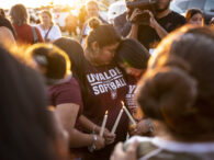 Hundreds of people gathered at a vigil Wednesday night