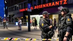 Latest from Norway shooting Security forces stand at the site where several people were injured during a shooting outside the London pub in central Oslo