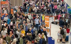 Airport chaos as luggage abandoned and passengers ‘forced to sleep on floor’