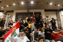Iraqi protesters storm the parliament in Baghdad’s Green Zone