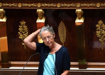 Élisabeth Borne survives no confidence vote, as Macron under pressure