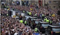 Queen’s coffin arrives in Edinburgh – thousands pack streets