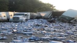 Florida highway closed after beer truck spills cans 