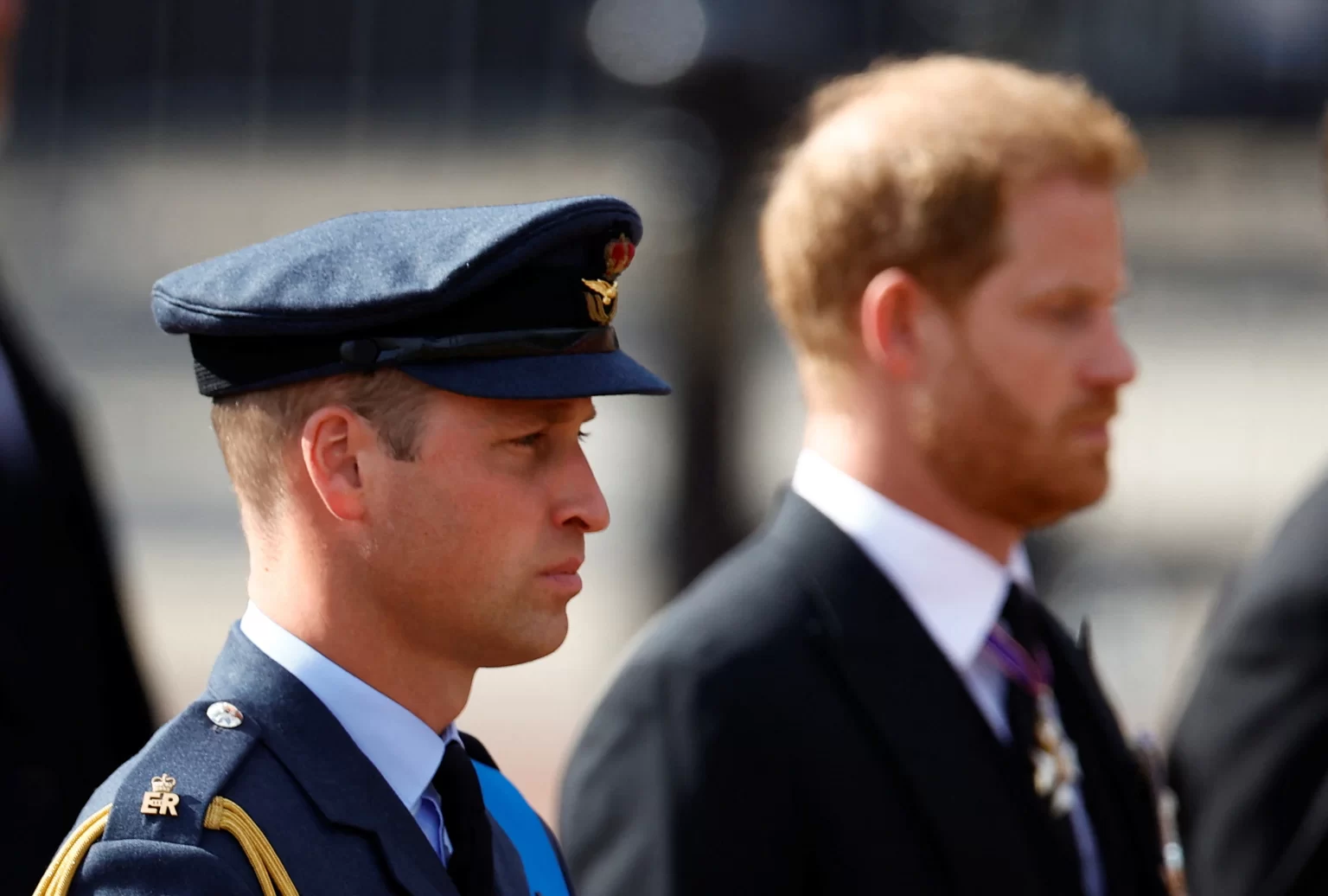 William and Harry side by side behind Queen's coffin