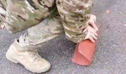 Ukrainian soldiers destroy Russian body armour with bare hands in humiliating video